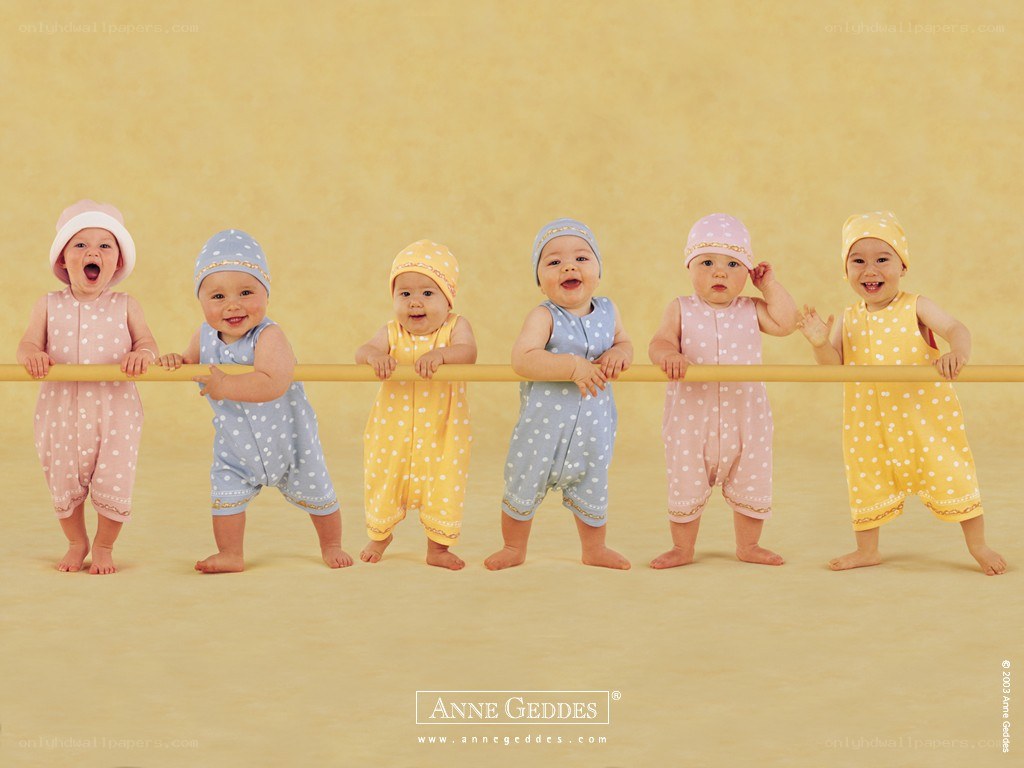 Babies in polka-dot outfits
