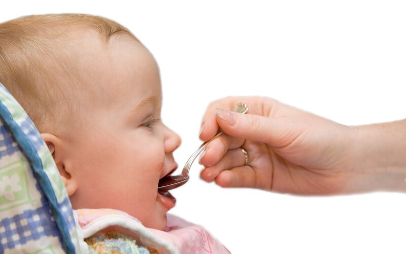 Baby Being Fed — White