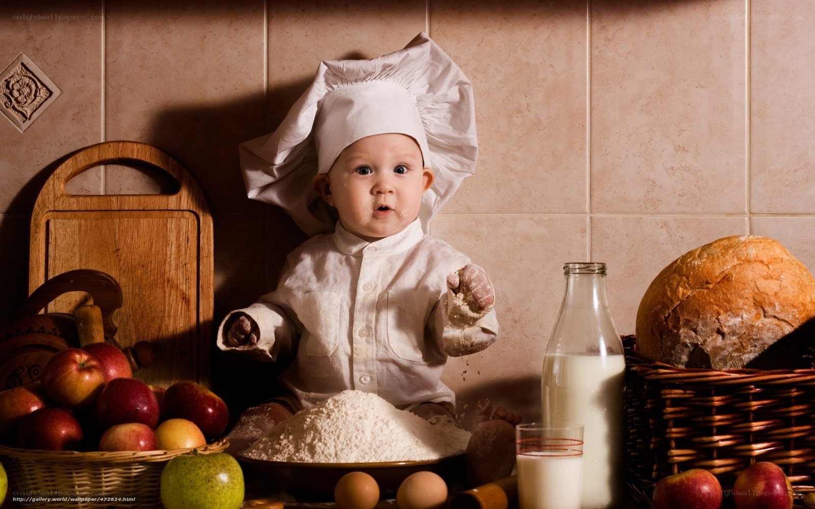 Baby chef in kitchen