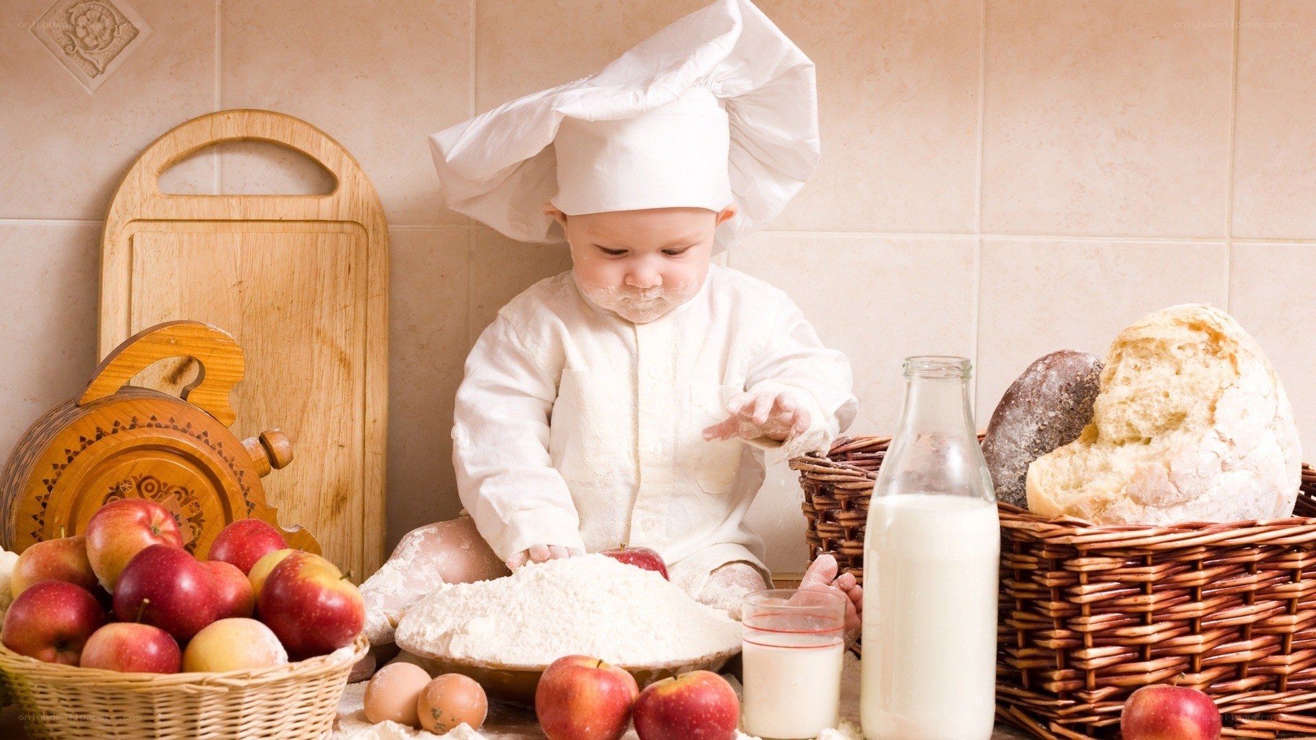 Baby chef in kitchen