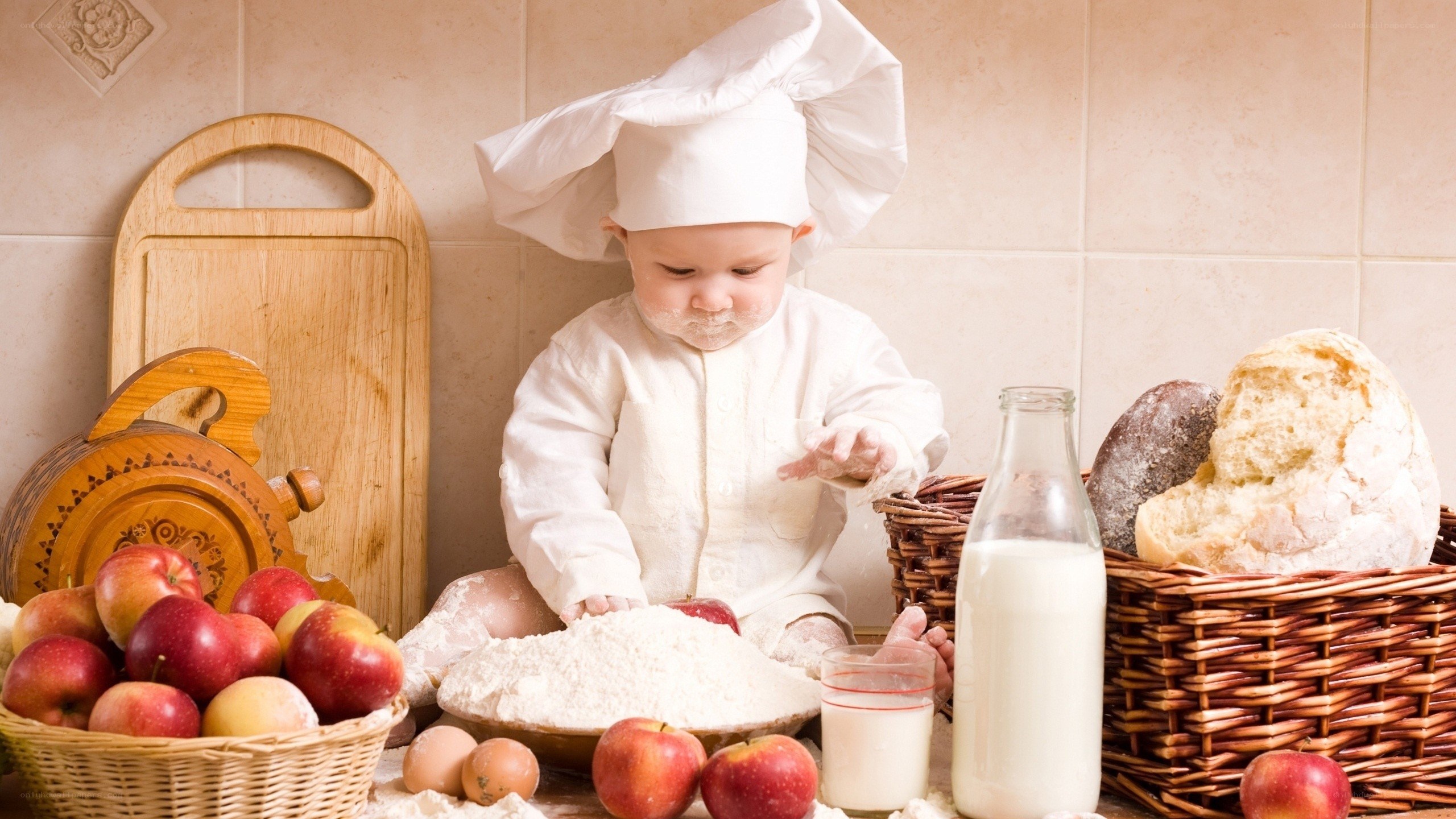 Baby chef in kitchen