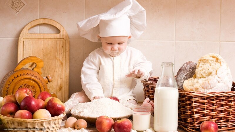 Baby chef in kitchen
