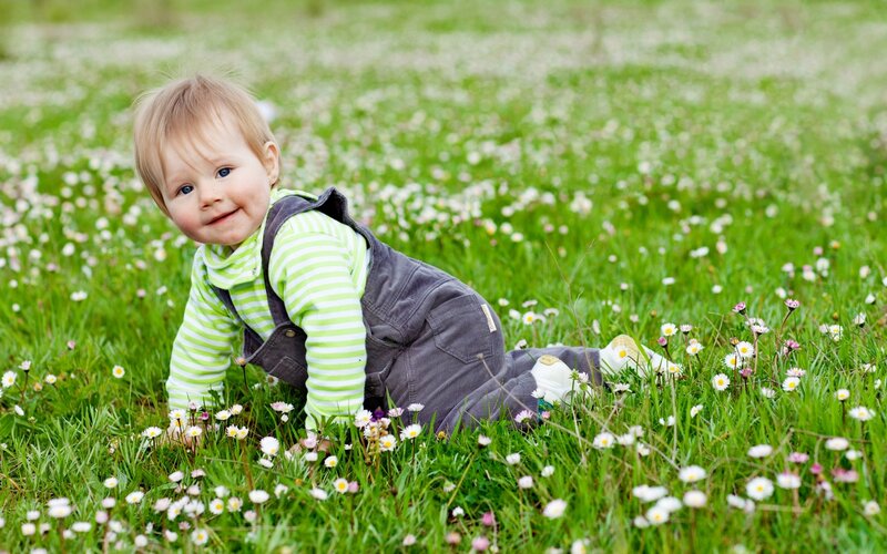 Baby Crawling in Grass