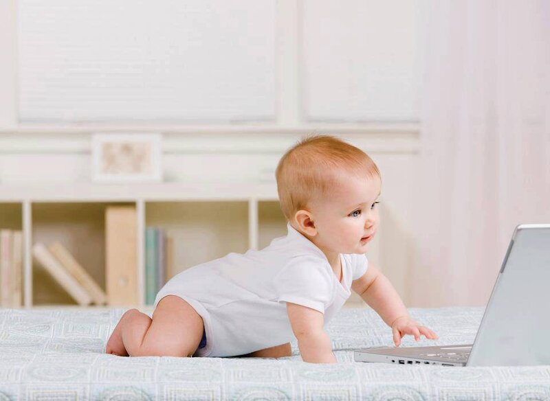 Baby Crawling on Bed
