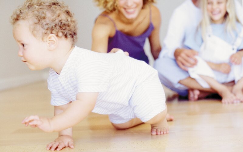 Baby Crawling on Floor — White