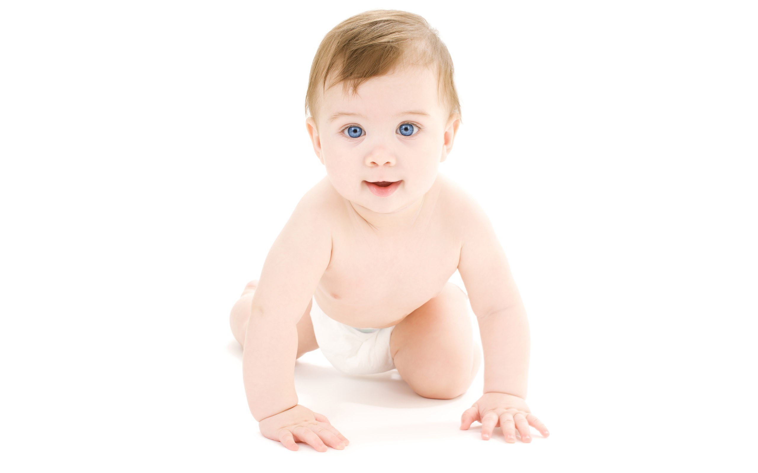 baby crawling on white