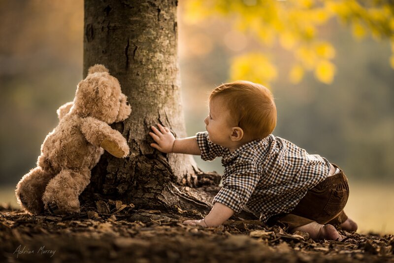 Baby Crawling with Teddy Bear