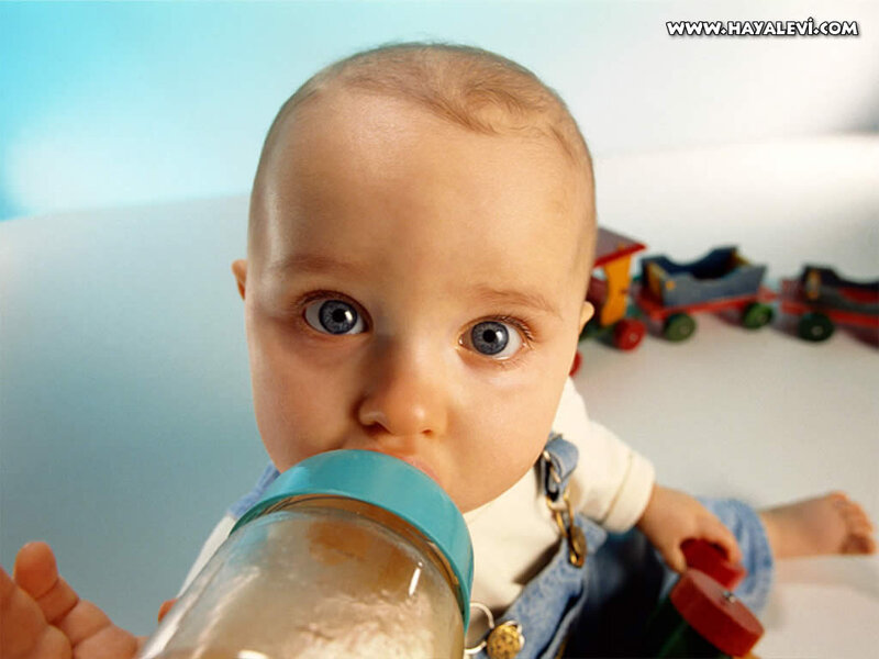 Baby Drinking from Bottle — Blue