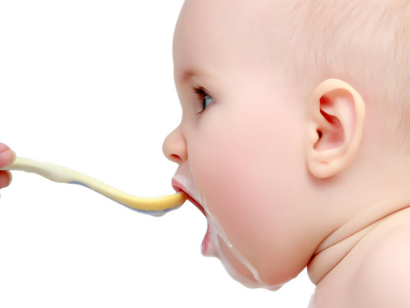Baby Eating from Spoon — White