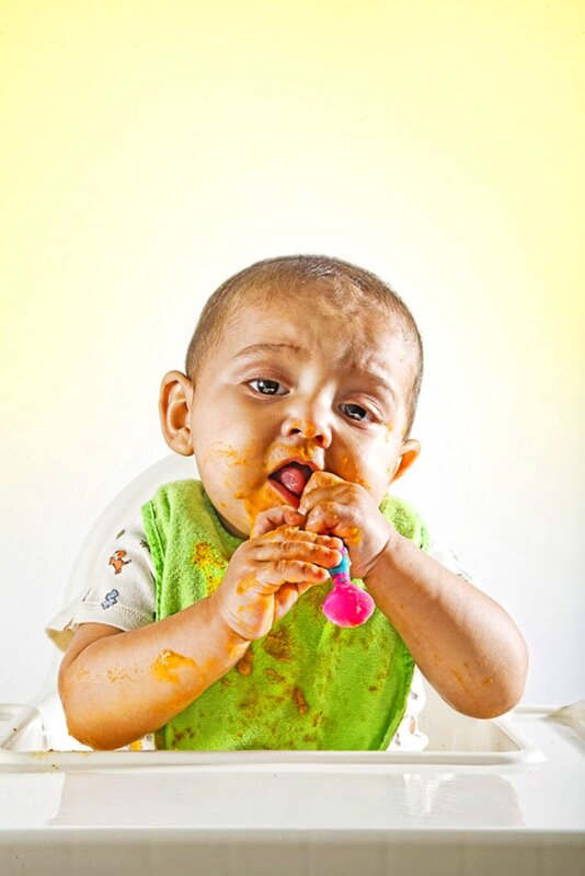 baby eating messy meal