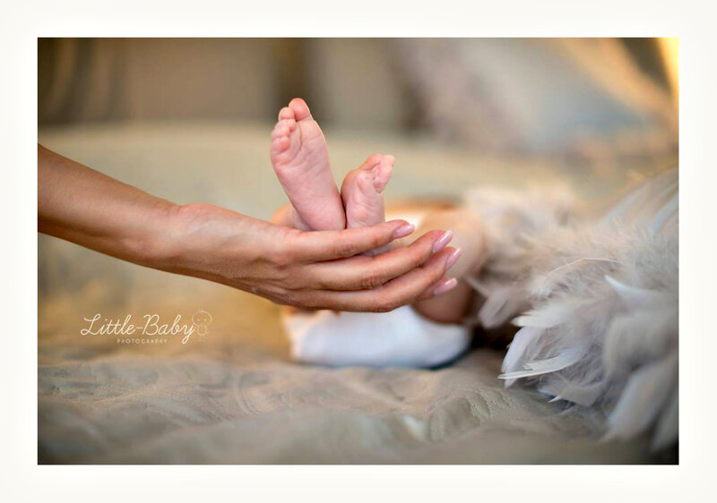 Baby Feet in Hands — Beige