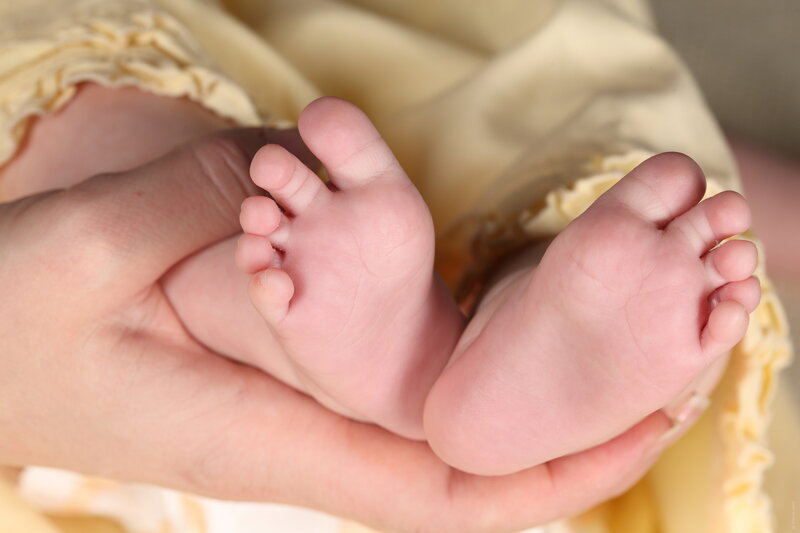 Baby Feet in Hands — Pink, Calm