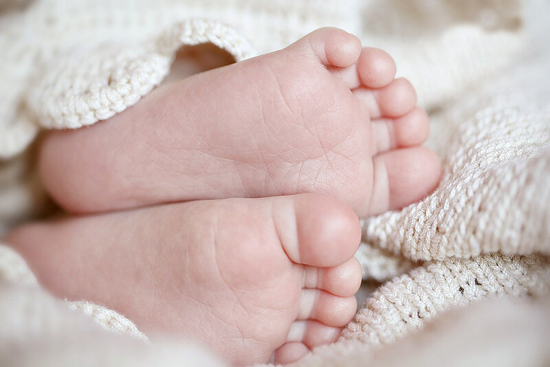 Baby Feet on Blanket — White