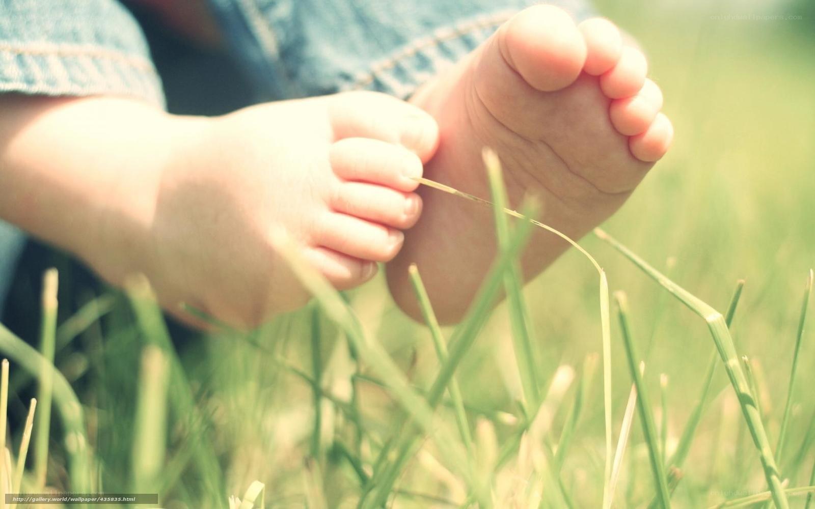 Baby feet on grass