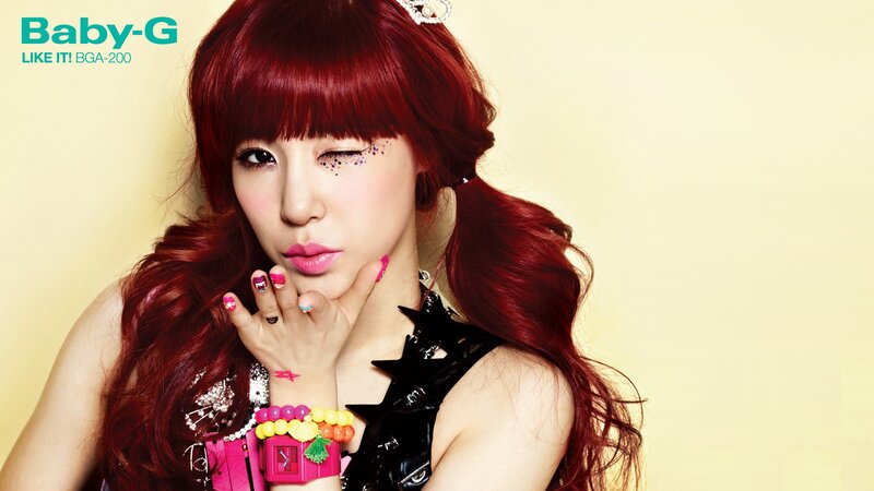 Baby-G advertisement with red-haired woman