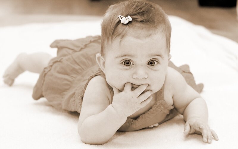 Baby Girl Crawling — Sepia