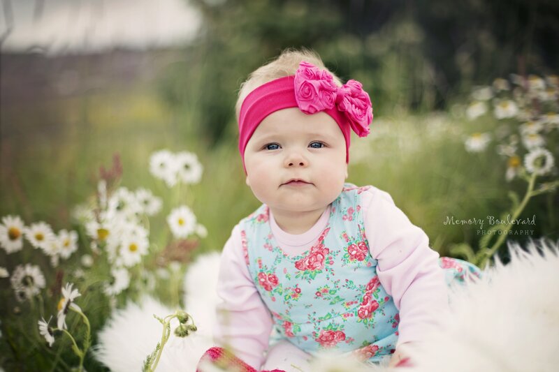 Baby Girl in Flowers