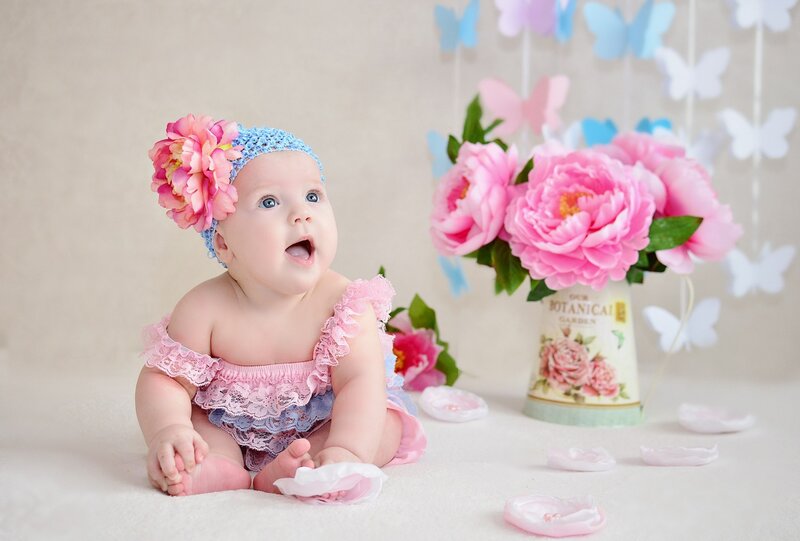 Baby Girl in Pink Dress — Playful