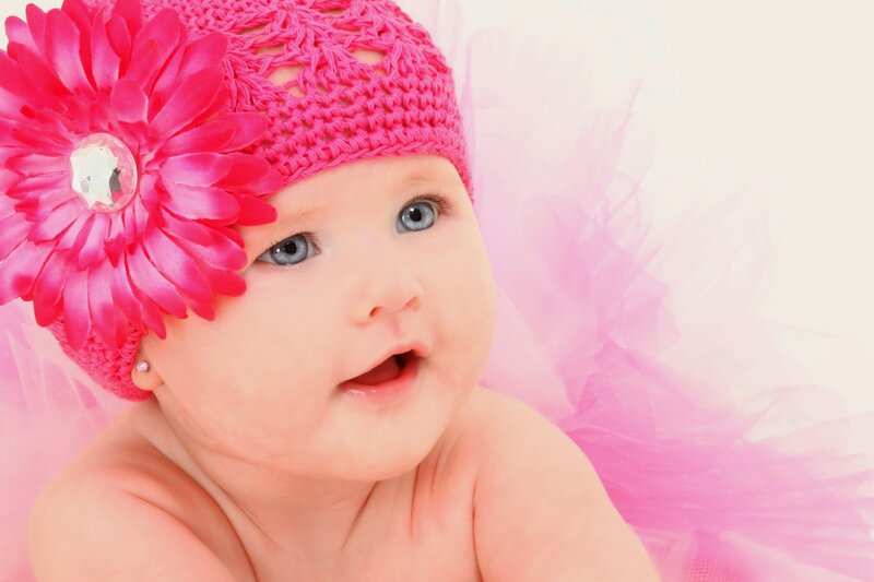 Baby Girl in Pink Hat — Innocent