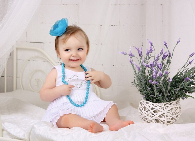 Baby Girl in White Dress — Happy