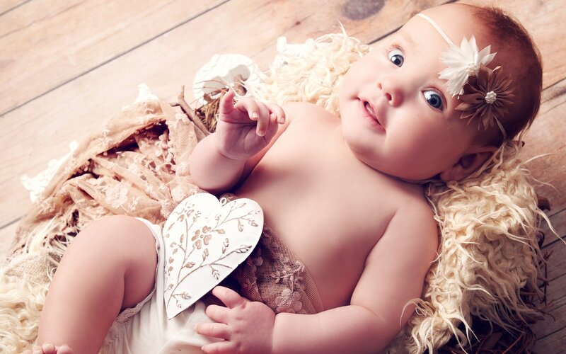 Baby Girl Lying Down — Beige