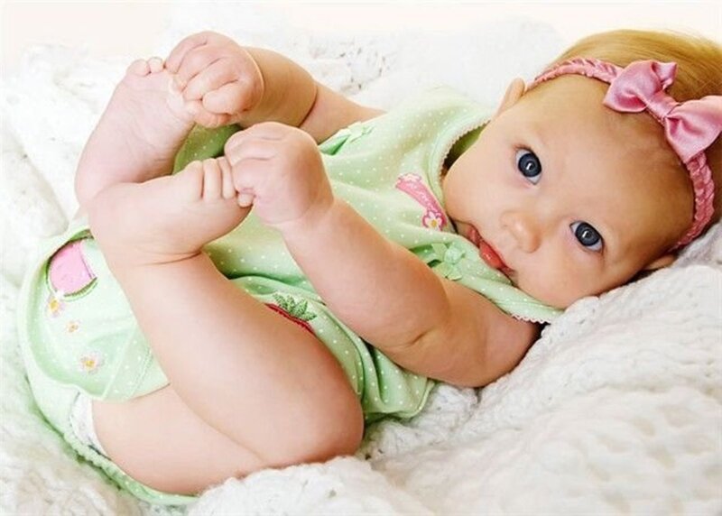 Baby Girl Lying Down — White