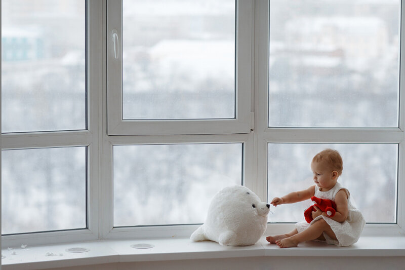 Baby Girl on Windowsill