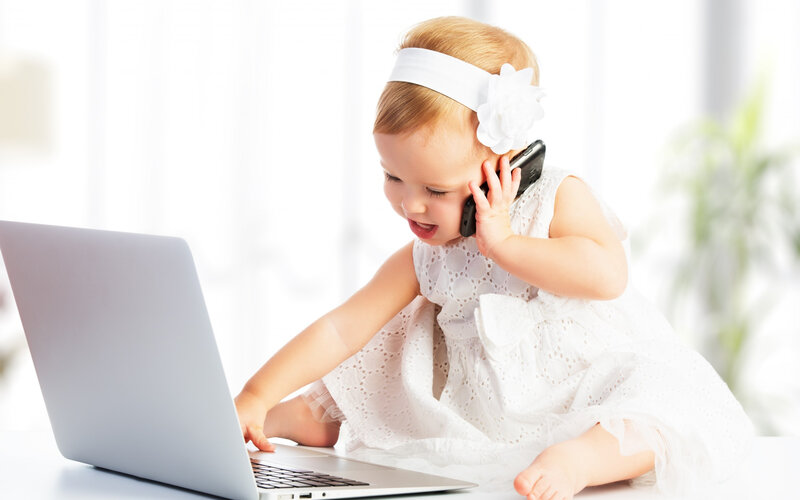 Baby Girl Using Laptop