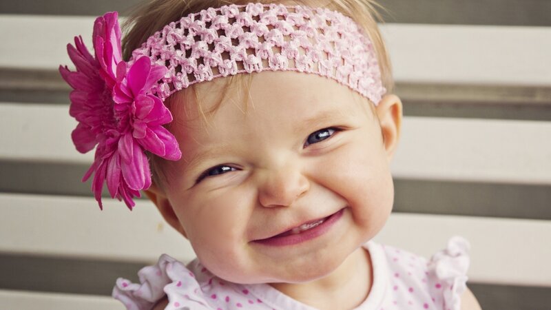 Baby Girl with Flower