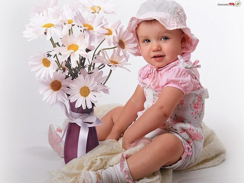 Baby Girl with Flowers