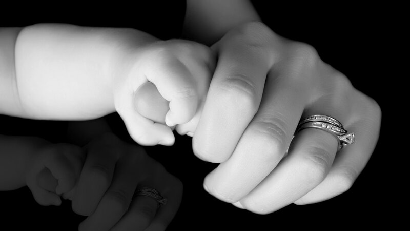 Baby Hand Holding Adult Hand — Black, Intimate