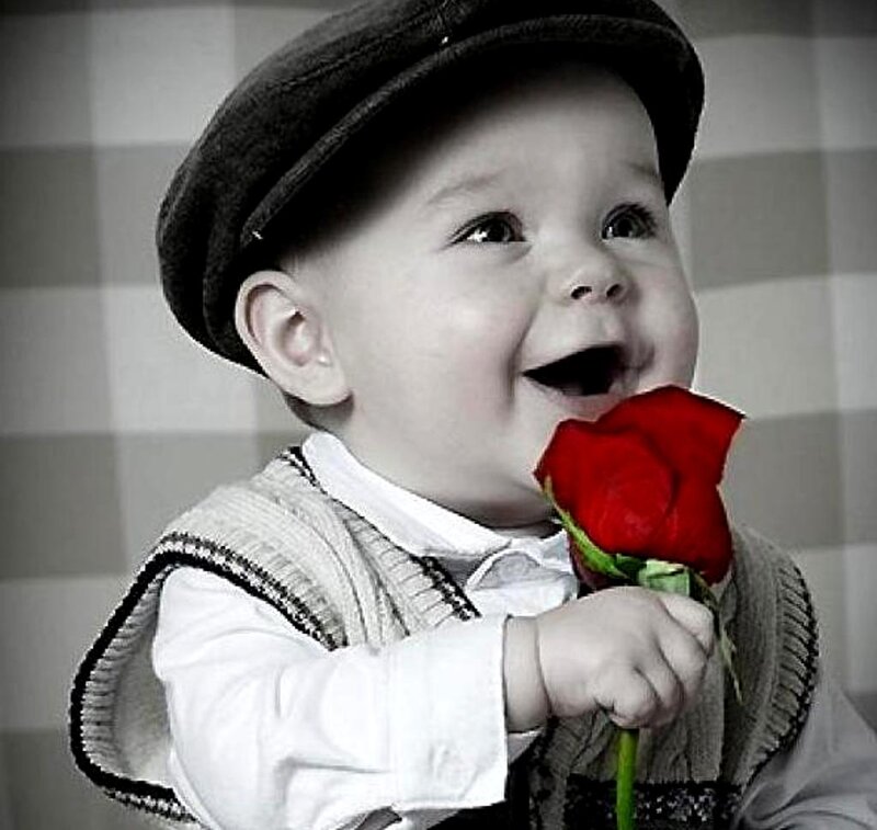 Baby Holding Rose