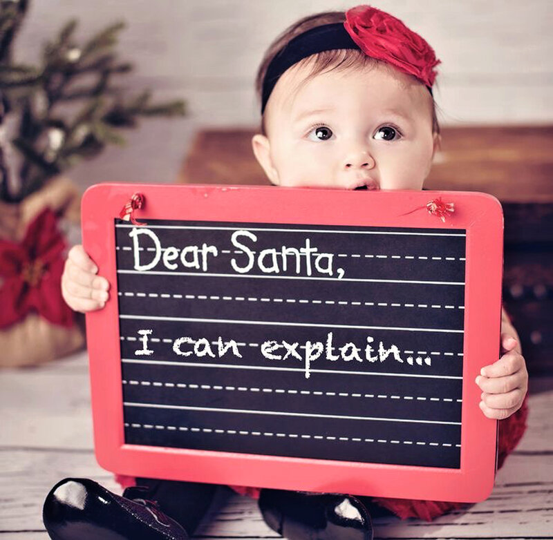 Baby Holding Sign