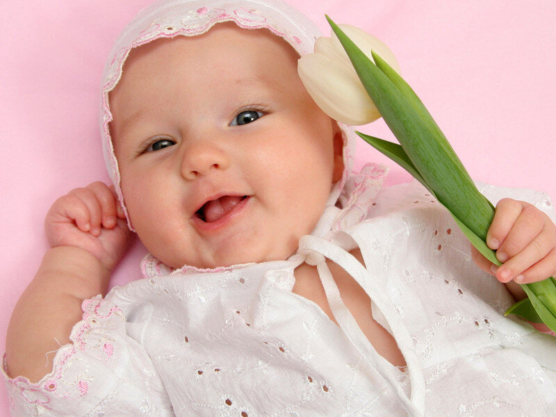 Baby Holding Tulip