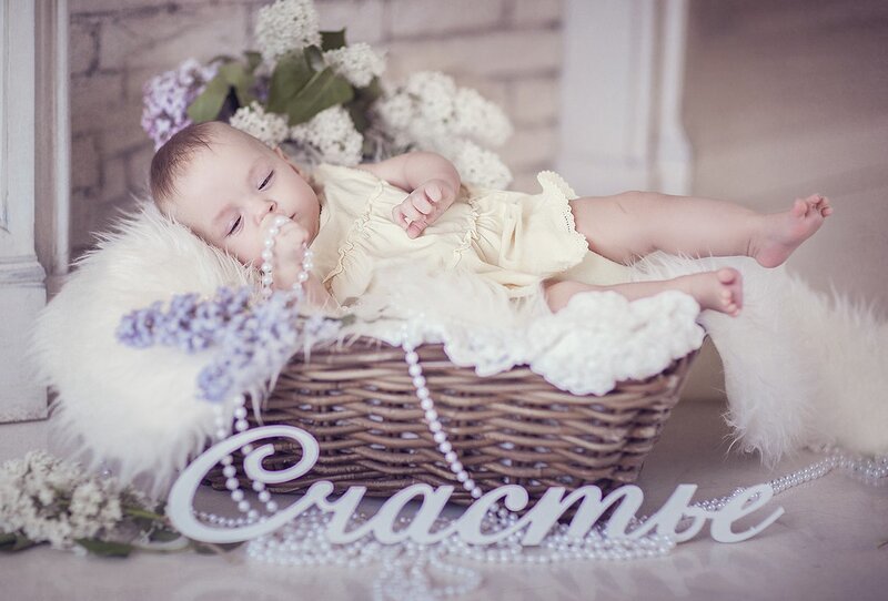 Baby in a Basket — White, Serene, Photograph, Flowers