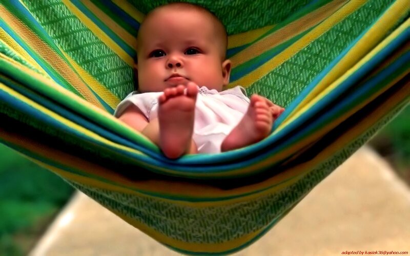 Baby in a colorful hammock