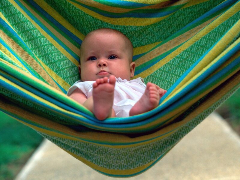 Baby in a colorful hammock