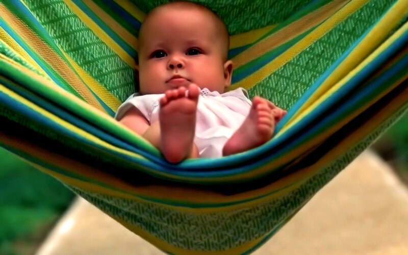 Baby in a colorful hammock