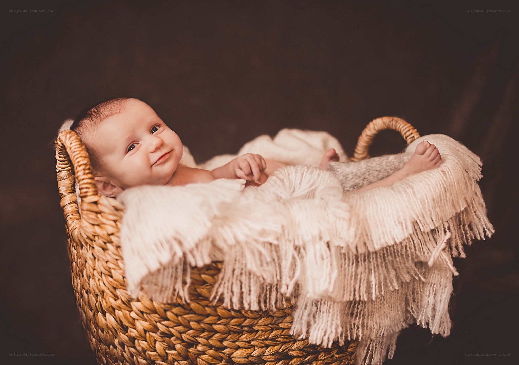 Baby in a woven basket