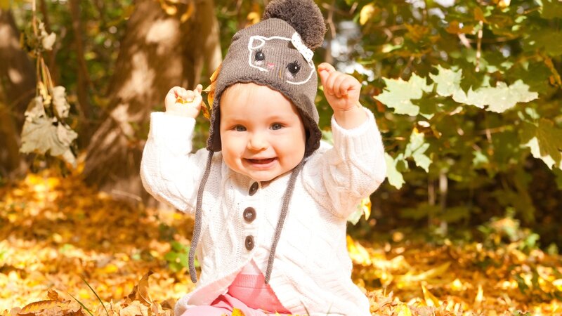 Baby in Autumn Leaves — White, Happy