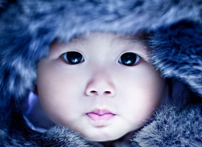 Baby in Fur Hood