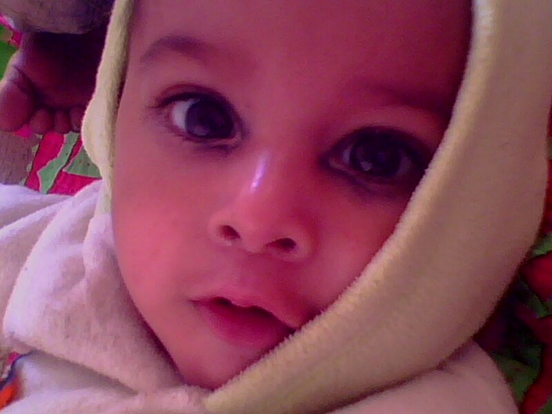 Baby in Hooded Garment