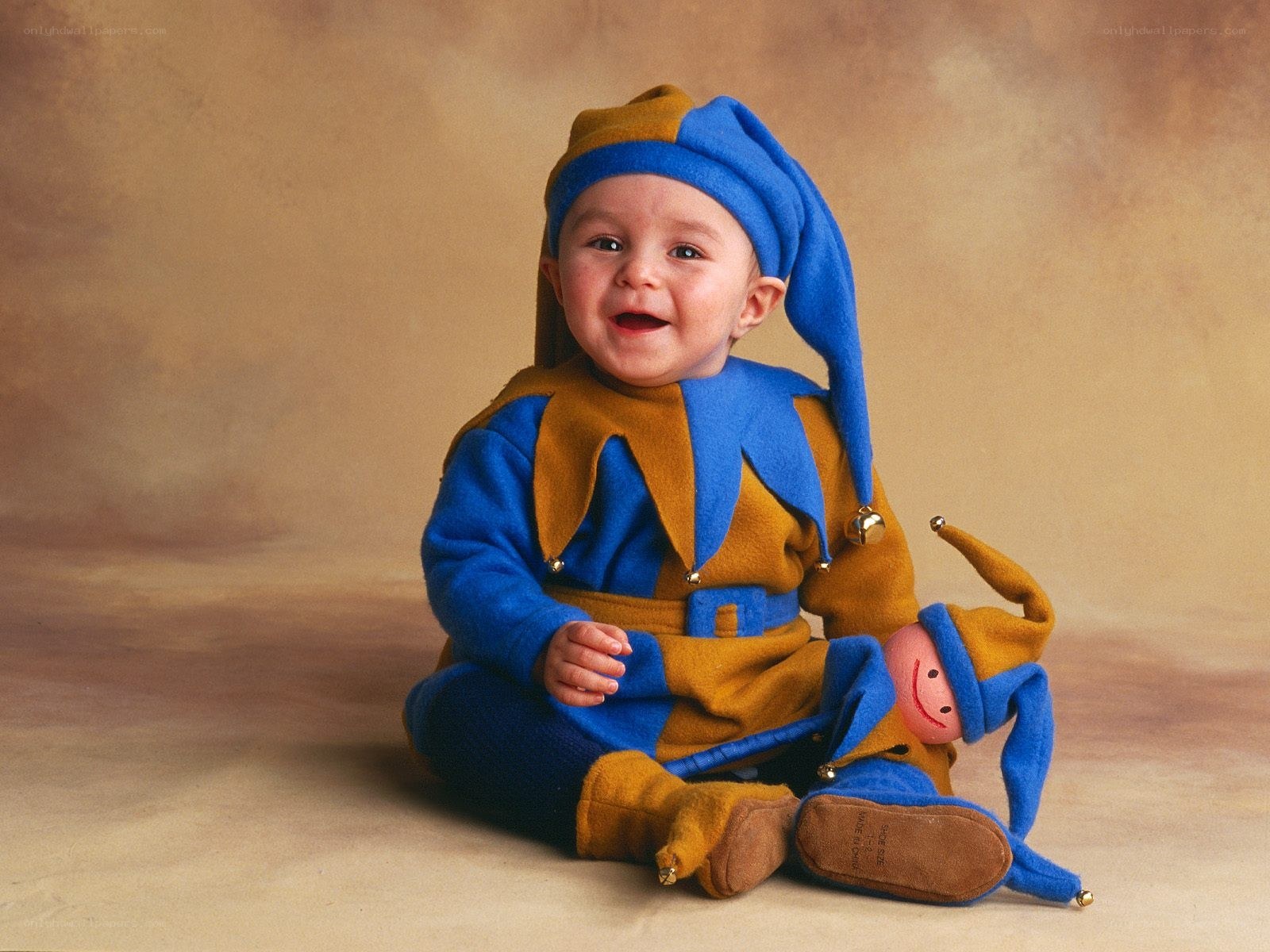 Baby in jester costume