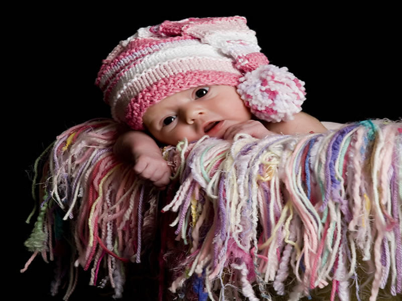 Baby in Knitted Hat — Pink