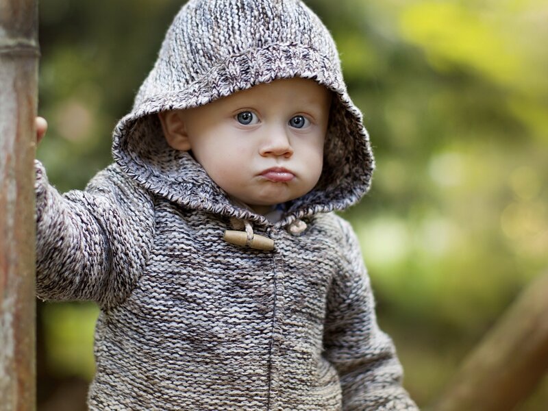 Baby in Knitted Hoodie — Gray
