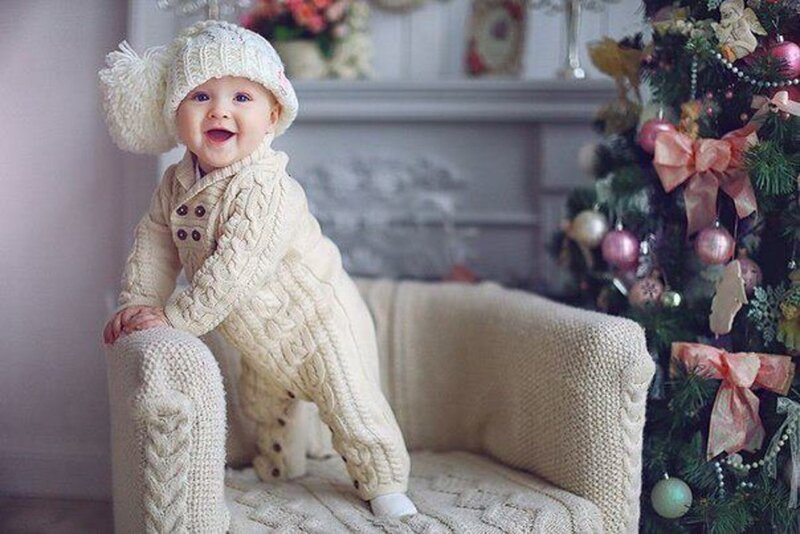 Baby in Knitted Outfit — White