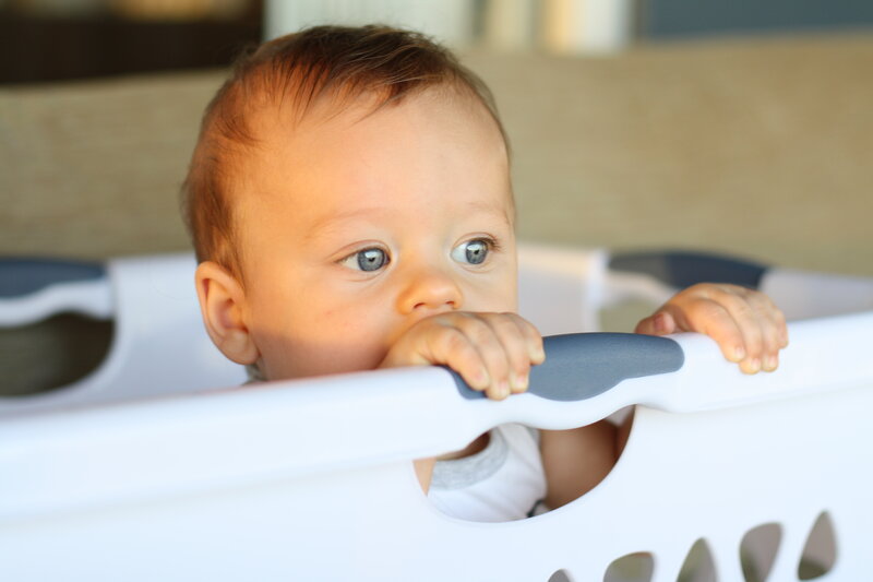 Baby in Laundry Basket