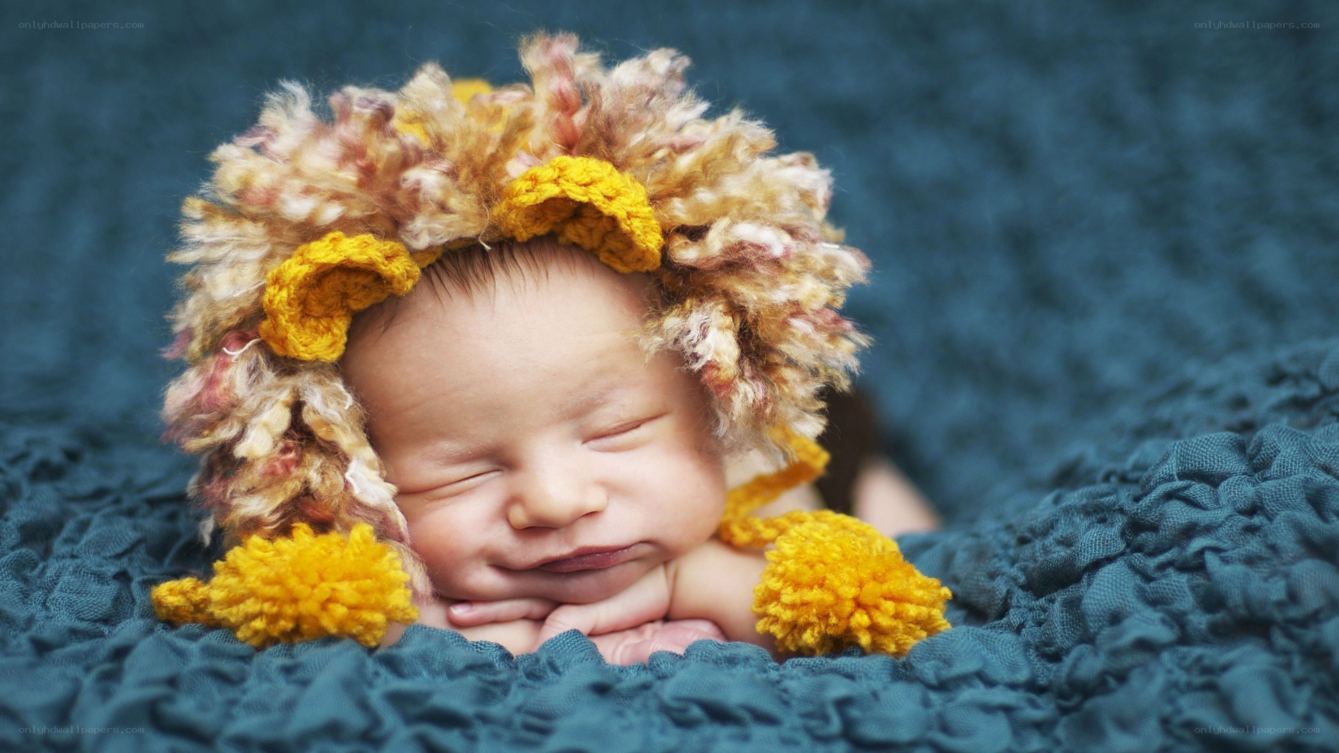 Baby in lion hat