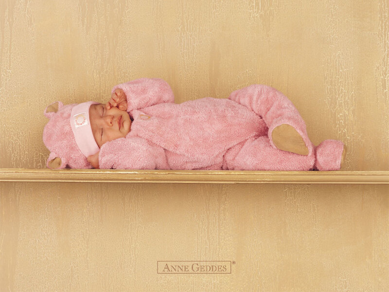 Baby in pink bear onesie