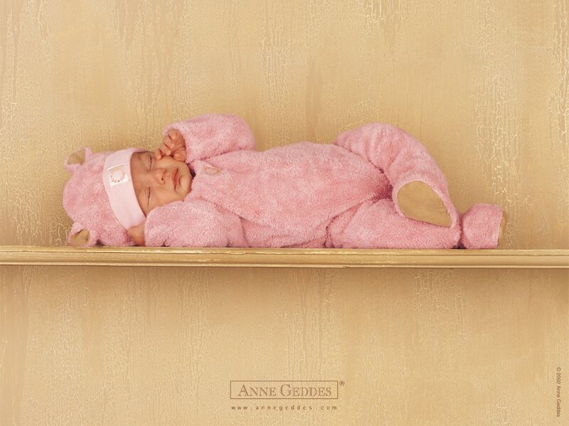 Baby in pink bear onesie